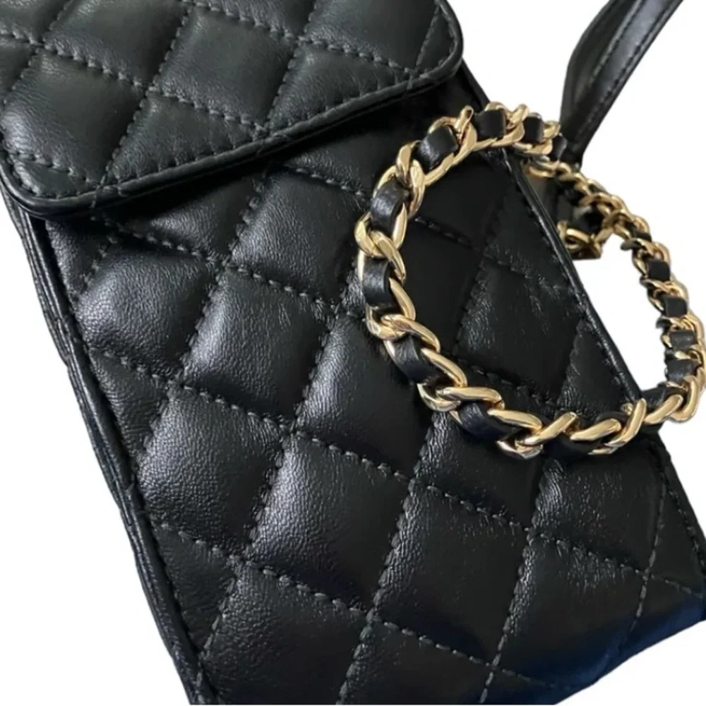 Micheal Kors Sloane black quilted leather crossbody gold hardware snap closure
